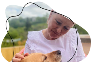 Sarah with her pet dog.
